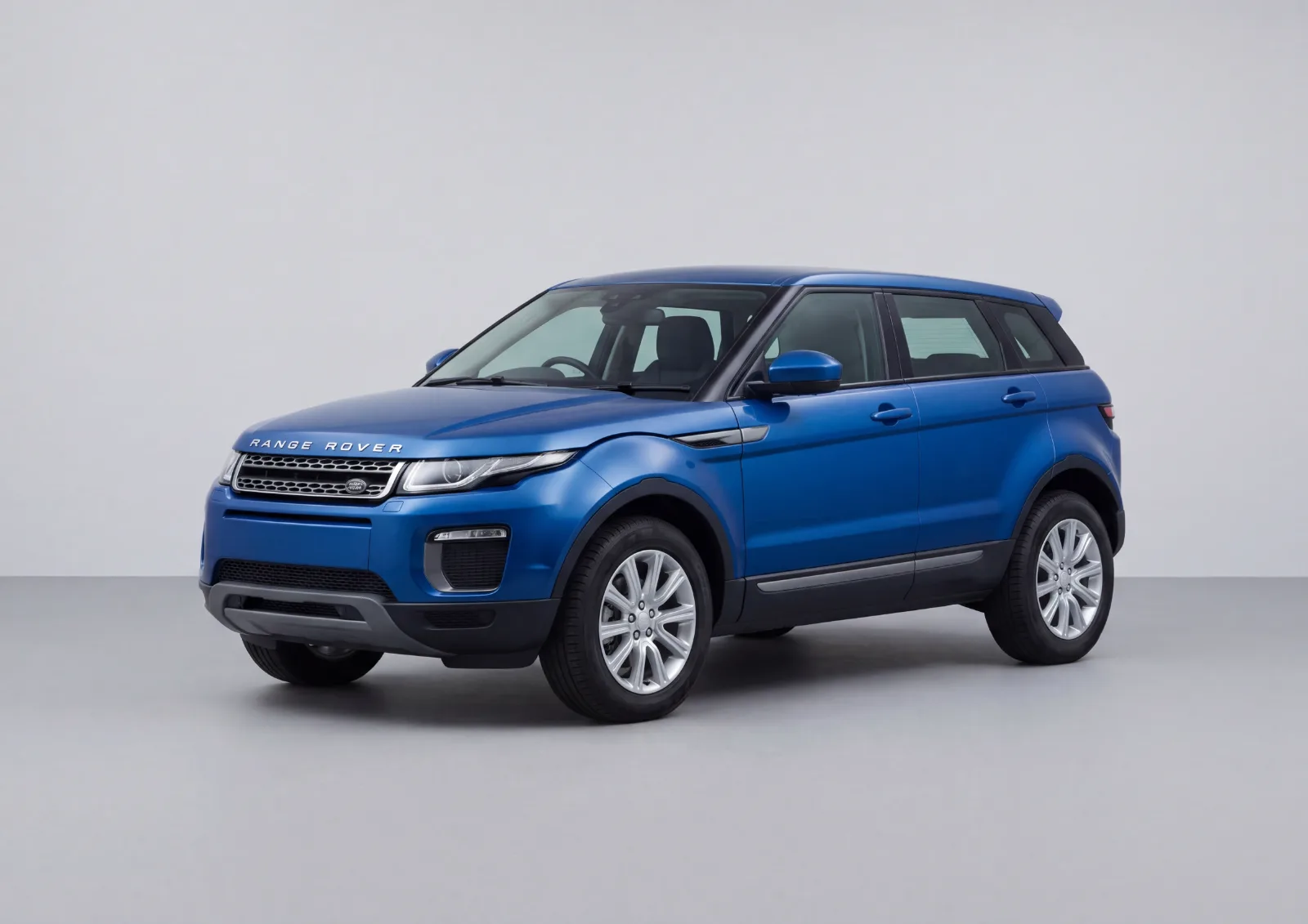 Range Rover Evoque P250 R-Dynamic SE (2024) in Blue · Gloss, Carbonography print
