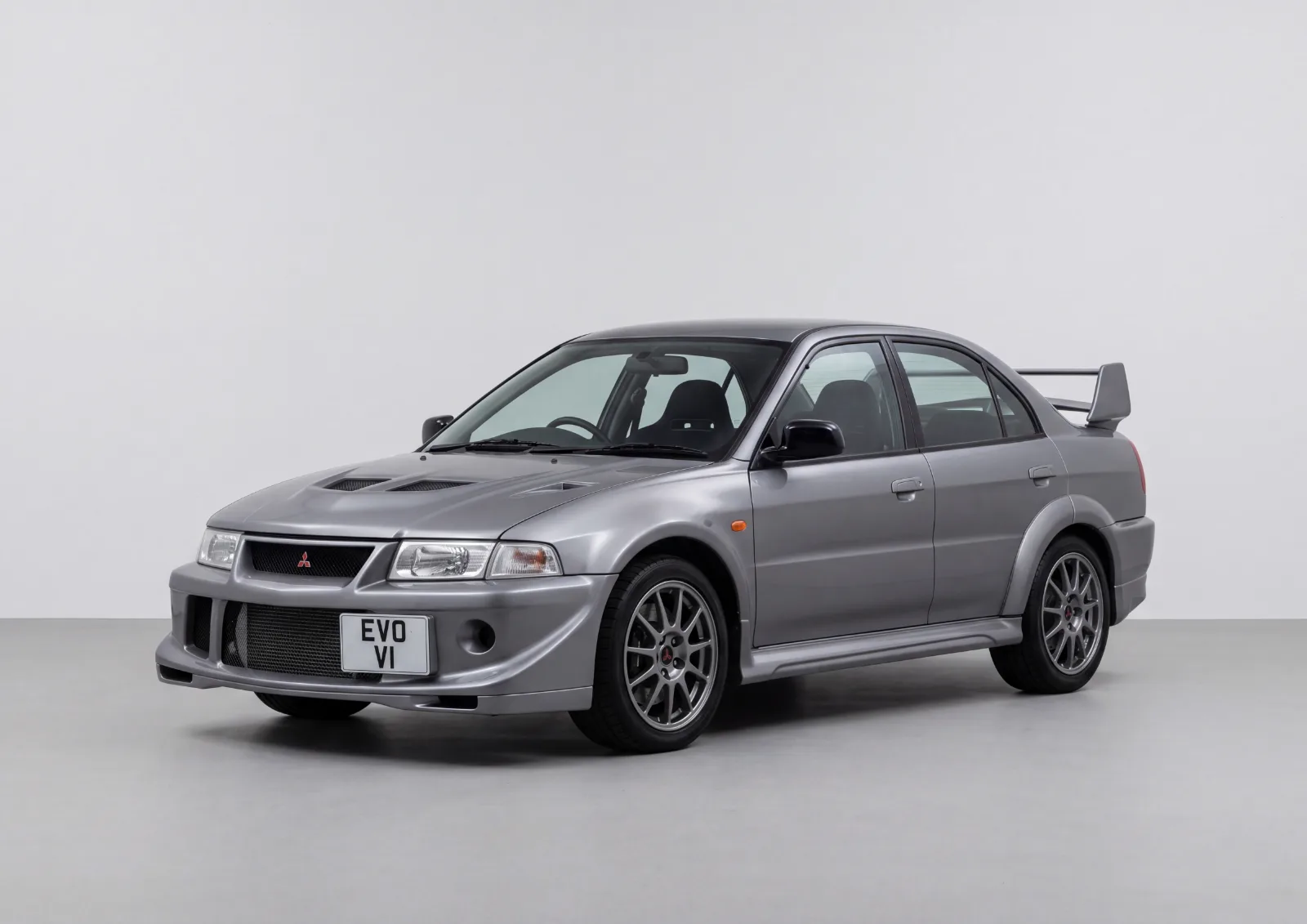 2000 Mitsubishi Lancer Evolution VI Tommi Mäkinen Edition in Mid grey · Gloss, Carbonography print